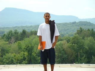 Jordan standing atop a memorial during his first day at Amherst College.